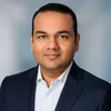 Corporate headshot of Dr. Vikram Singh